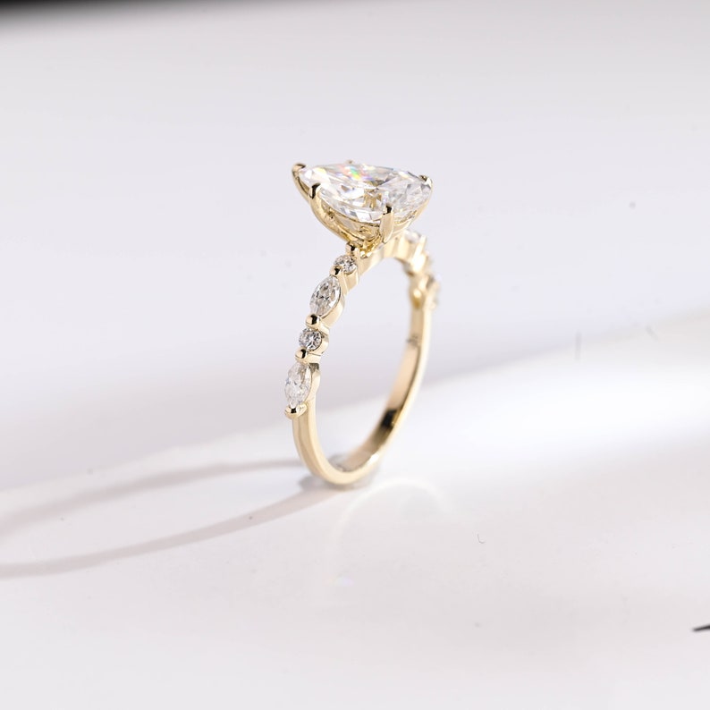 Stunning 1.0 - 2.0 CT Pear Moissanite Engagement Ring with Half Pave Design 7